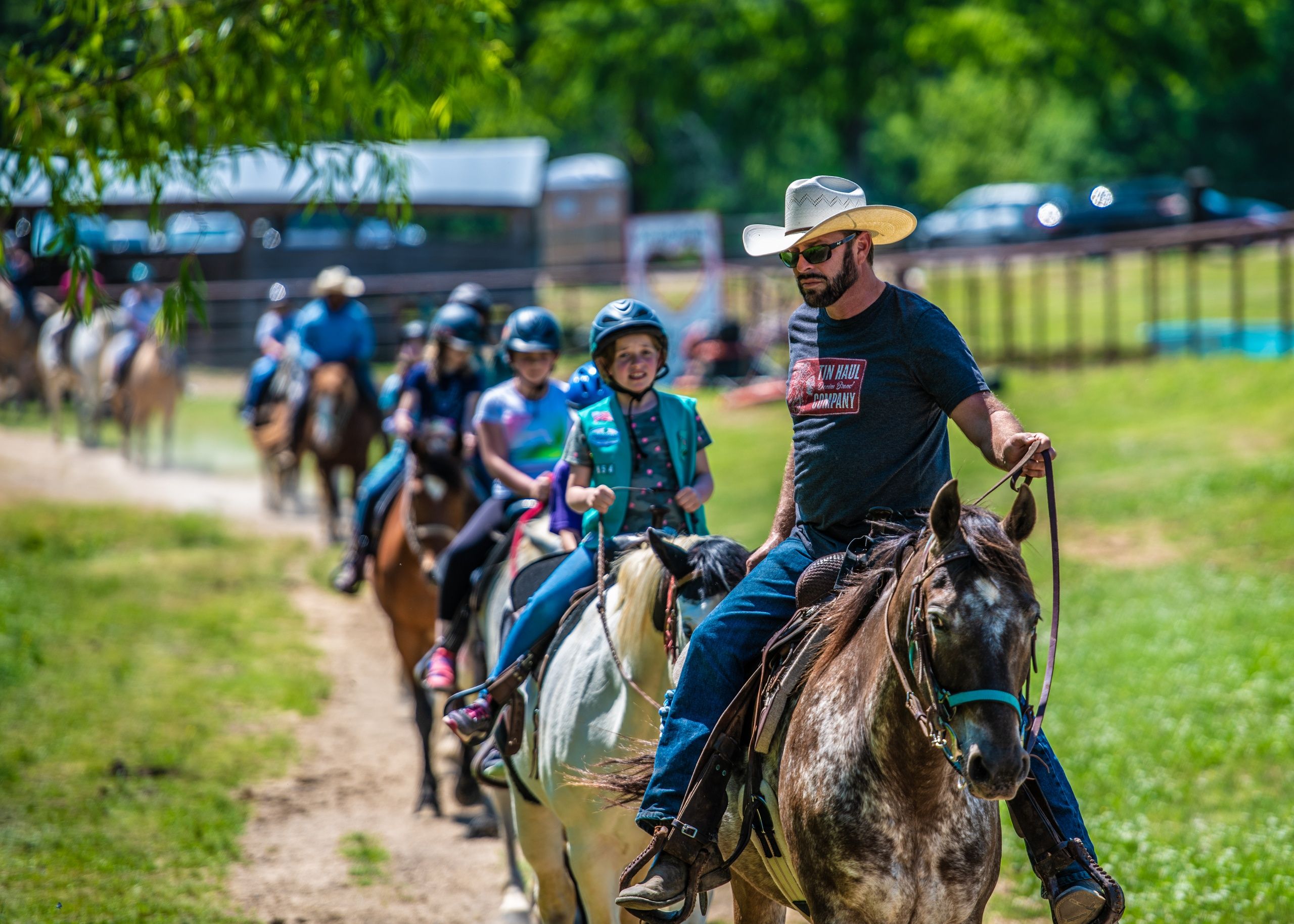 Riders on the 1 Hour Ride through the forest of Shelby Farms Park
