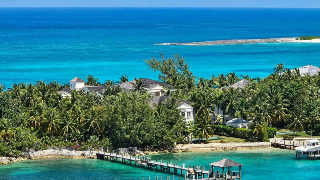 Waterfront homes and dock in Marsh Harbour Bahamas scene.