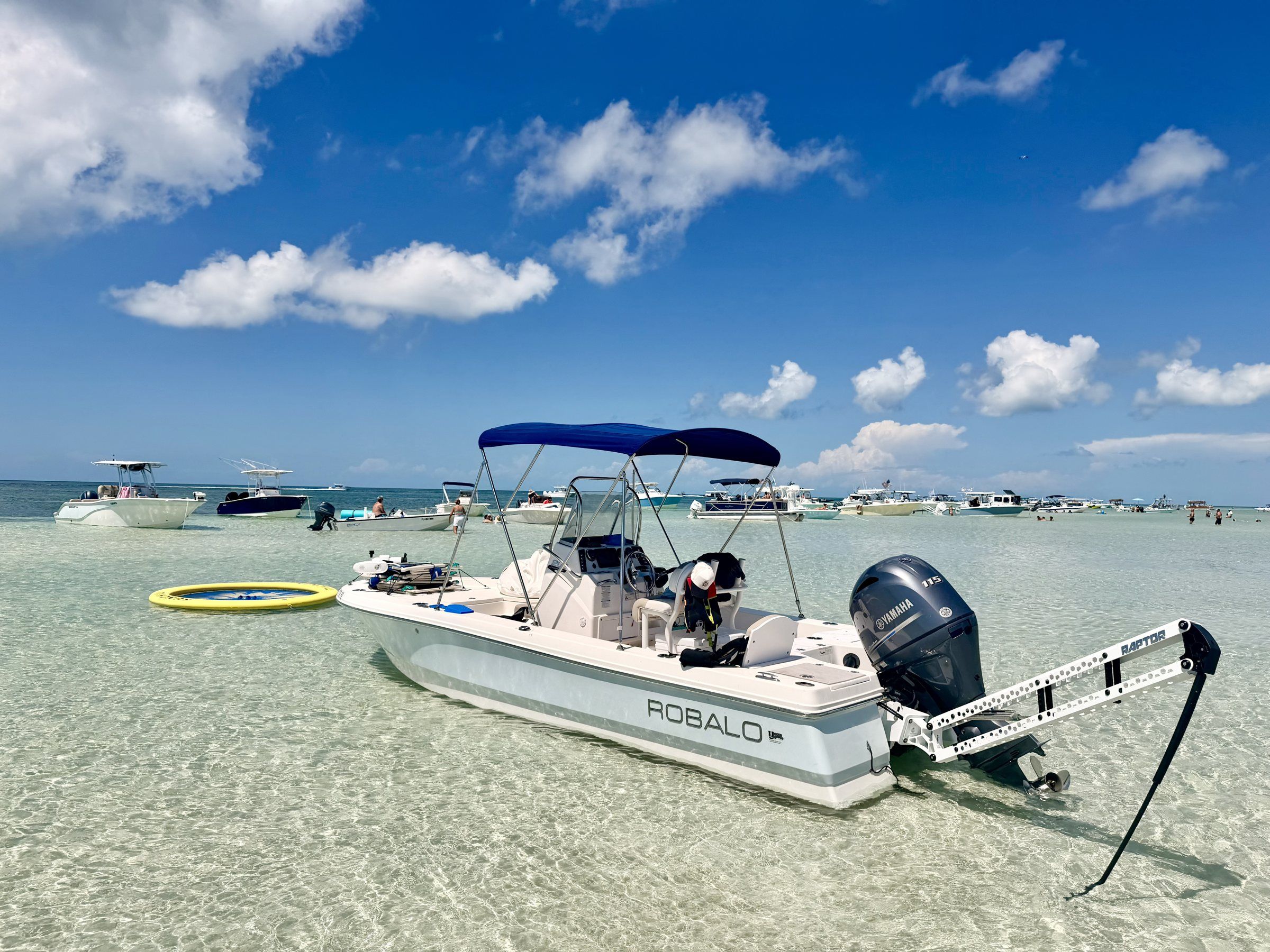 Robalo bay boat anchored at a Key West sandbar