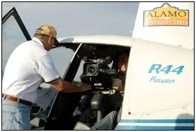 Professional aerial photography and video equipment inside a helicopter