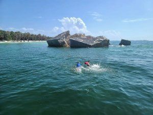 a small boat in a body of water